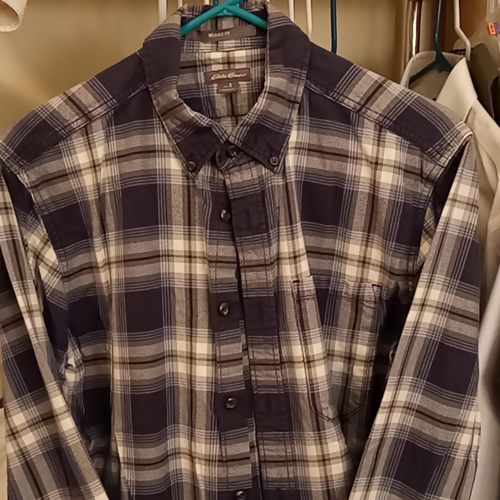 Eddie Bauer shirt in Blue and white checkered design. Size S with a relaxed fit.